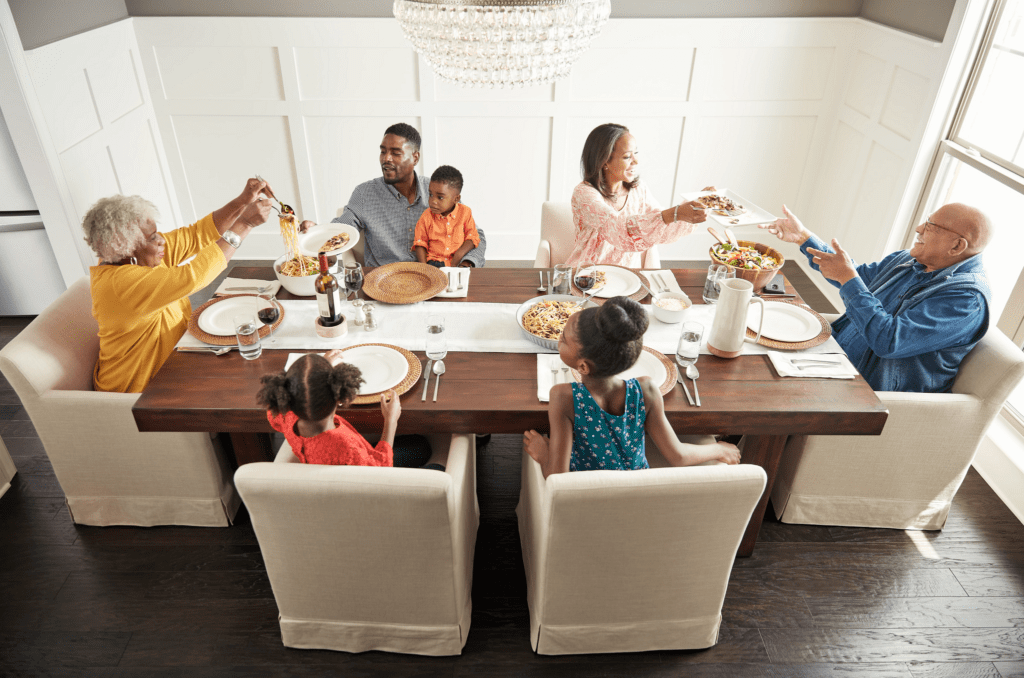 Family having breakfast at the dining table | Flooring Concepts